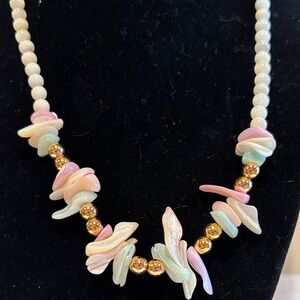 Elegant Mother of Pearl and Dyed Shell Beaded Necklace with Gold Toned Beads.